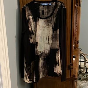 Long sleeve, different shades of browns, and angled blouse